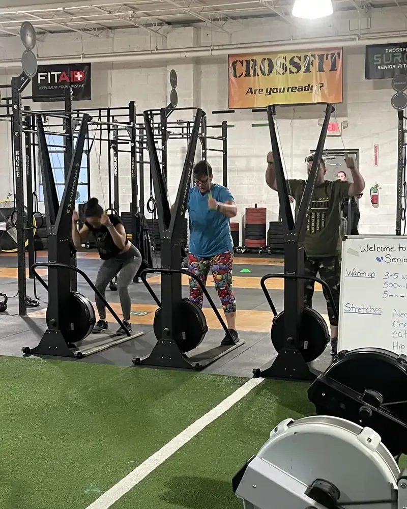 Members training on ski ergs at CrossFit Surge
