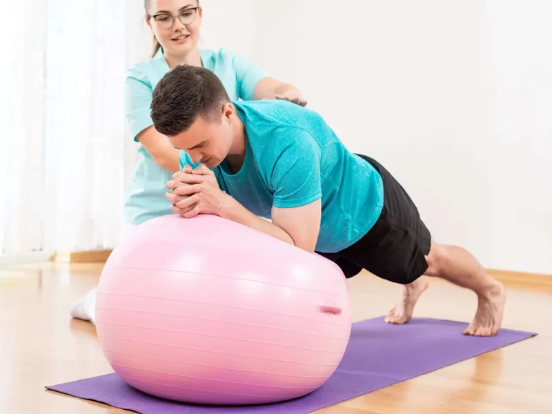 Patient performing progressive strength training under supervision